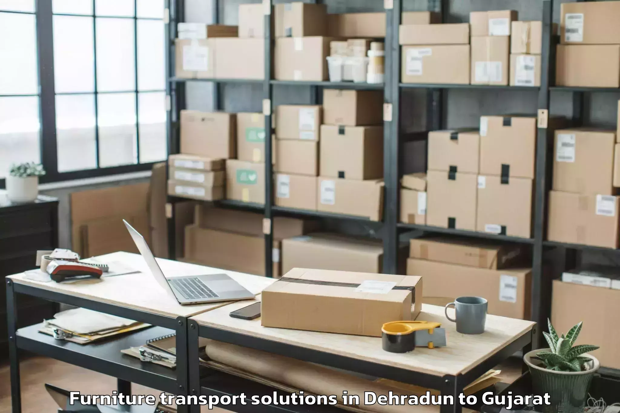 Expert Dehradun to Gandhinagar Furniture Transport Solutions